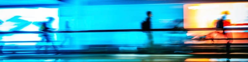 People running on an escalator