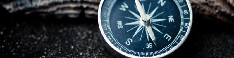compass-on-wood