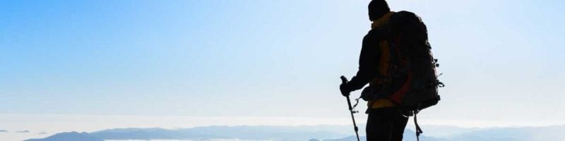 hiker above the clouds