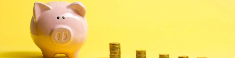 piggy bank and stacked coins